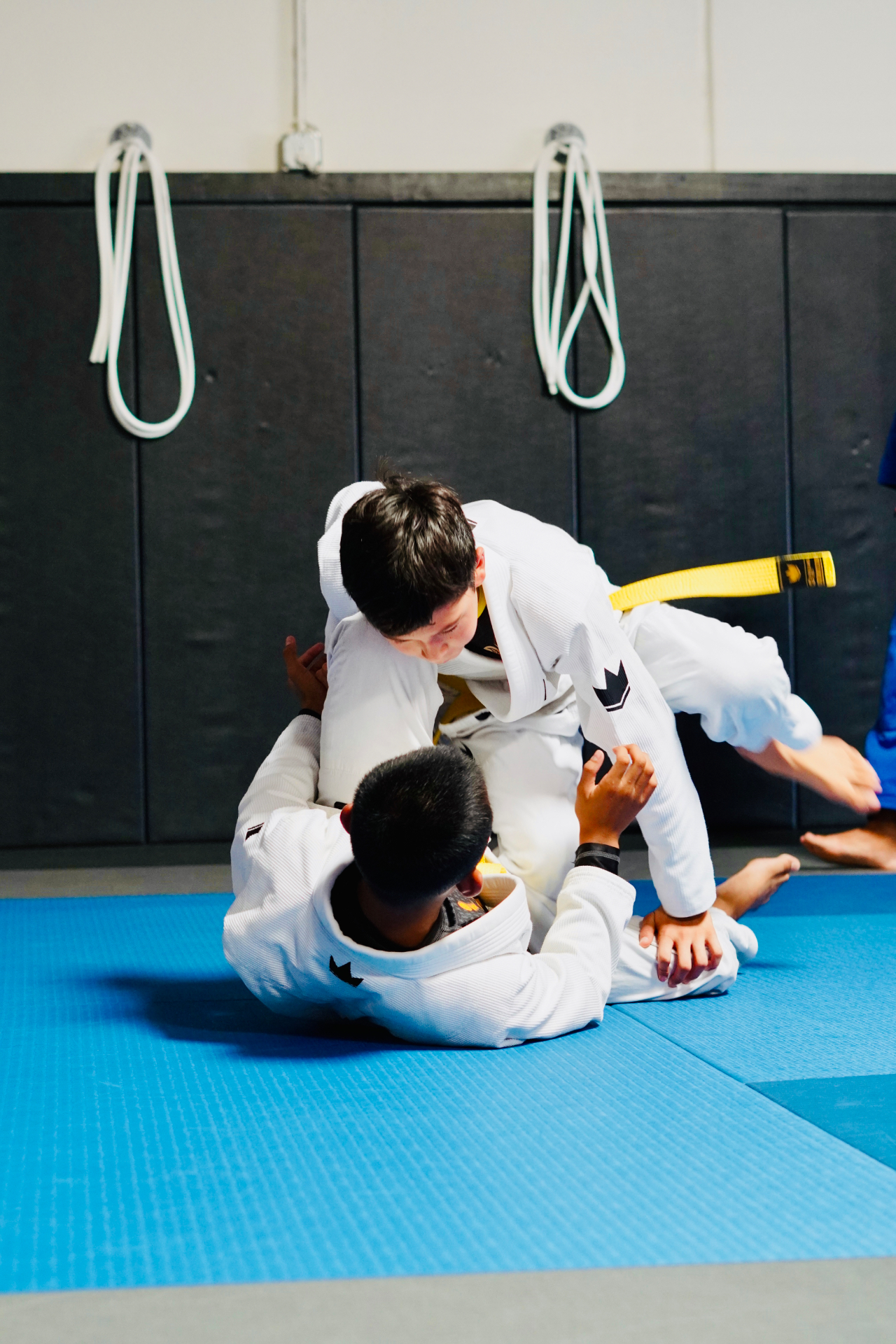 GDA youth athletes working guard posture in a live positional round